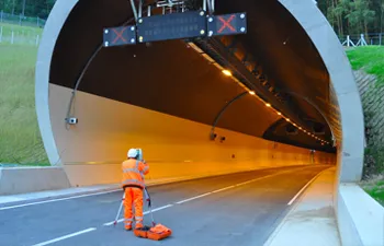 Land Topographical Surveyor with Leica Total Station at Hinehead Tunnel